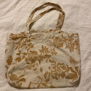 Cream Sezane cloth tote with floral pattern